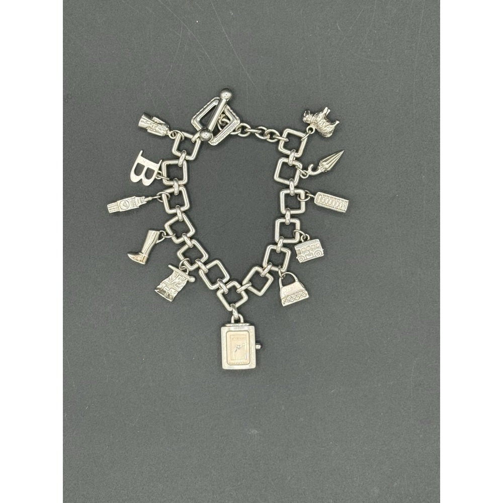 Burberry BU5200 Sterling Silver 10 Charm Bracelet Watch Swiss Quartz 925